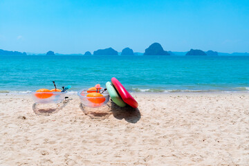 landscape of boat and surfboard  on the white beach and blue sea preparing for traveler