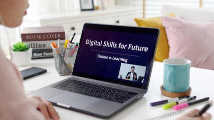 Rear view young asian woman listen watch digital class e-learning online for employee reskill...