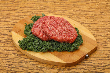 Raw beef burger cutlet for cooking
