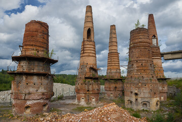 Ruins of kilns for burning lime from an old marble and lime plant on a cloudy August day. Ruskeala,...