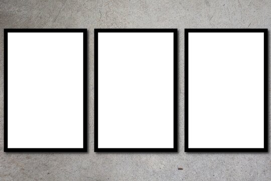 White empty poster with three frame mock-up on grey cement wall