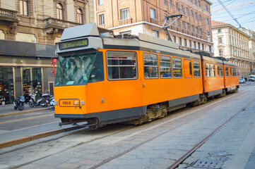 Fototapeta na wymiar City tram traversing in Italy