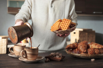 Black coffee and fresh pastries.