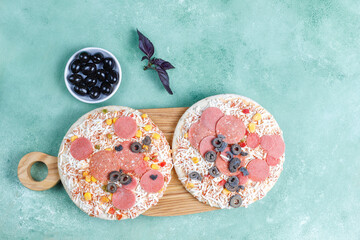 Fresh homemade frozen mini pizzas.