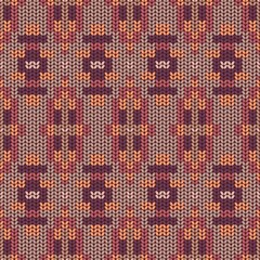 Geometric ornament of rhombuses and triangles in the native American style. Seamless pattern in knitted style for web, print, textile, wallpaper, card, wrapping paper and background