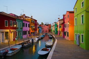 Fototapeta na wymiar Twilight on the canal of the colorful island of Burano, Italy