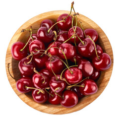 wooden bowl of sweet cherry fruits isolated on white background