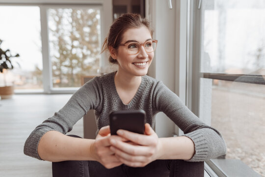 Happy motivated positive young woman with a beaming smile