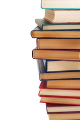 Stack of old books isolated on white background. Vertical photo