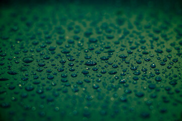 Rain drops fallen on a surface for wallpaper