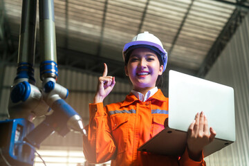 engineer specialist asian female and  technician maintenance inspect relay robot arm system with...