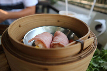 Fototapeta na wymiar ham rolls, Chinese steamed dumpling or dim sum or Chinese food