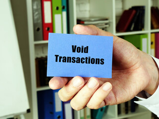 Financial concept meaning Void Transactions with phrase on the blue business card.