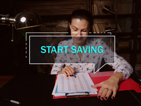  START SAVING Phrase On The Screen. Auditor Checking Financial Report The Money That You Keep In An Account In A Bank Or Similar Financial Organization