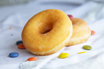 group of donuts with candies on the table