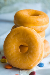 group of donuts with candies on the table