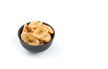 Pieces of dried banana on a white background with space to copy.