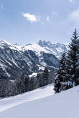 Fototapeta na wymiar Snow covered peaks of the Alps.