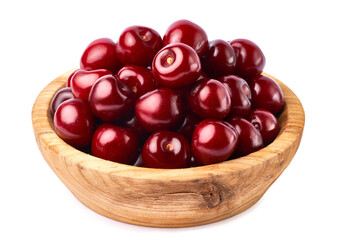 wooden bowl of sweet cherry fruits isolated on white background