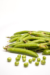 fresh organic peas isolated on white background