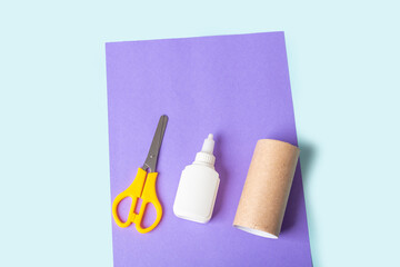 DIY and kids creativity. Step by step instruction: how to make butterfly from toilet roll tube. Step1 prerpration tools: scissors, paper, glue. Children Craft workshop. Eco-friendly reuse recycle.