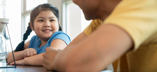 asian family conversation father and daughter casual cloth have a happiness talk together on dining table home sweet home ideas concept