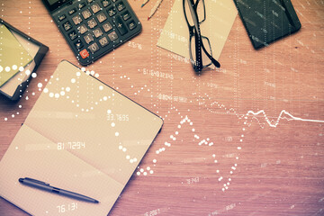 Double exposure of technology theme drawing over work table desktop. Top view. Global data analysis concept.