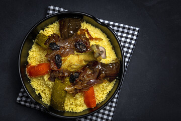 Traditional homemade couscous with chicken and vegetables.
