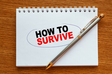 Notepad with inscriptions HOW TO SURVIVE on a white background. business concept.