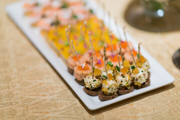 buffet food, catering food party at restaurant, mini canapes, snacks and appetizers