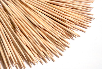 toothpicks arranged in a fan on a white background