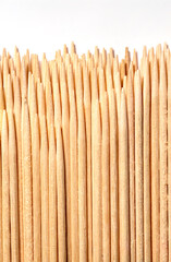 toothpick arranged vertically on a white background.