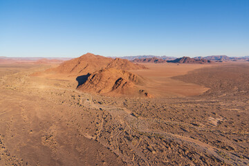 The desert of Namibia, aerial view. Natural scenery for travel to Africa.