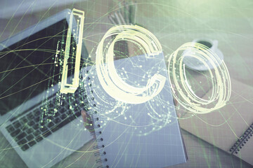 Double exposure of woman hands typing on computer and crypto market theme hologram drawing. Blockchain concept.