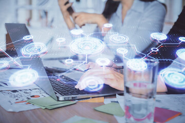 Double exposure of woman hands typing on computer and social network theme hologram drawing. People media concept.