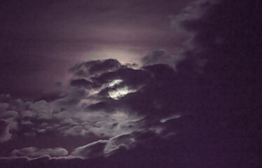 full moon in the sky with clouds