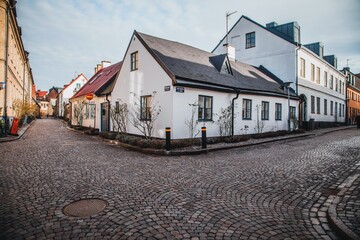 Fototapeta na wymiar View down the cobblestone streets in Lund, Sweden