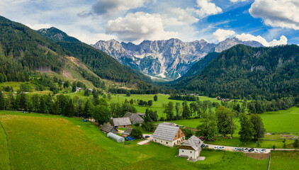 Aerial view of Alpine valley with farmhouse in Jezersko, Slovenia