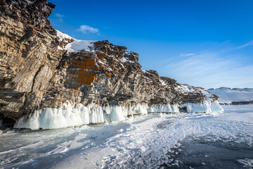 Fototapeta na wymiar Icy rock on the island of Baikal