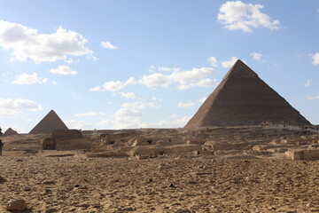 The great pyramids of giza. Tourists in the historic city. Beautiful landscape on a sunny day. View...