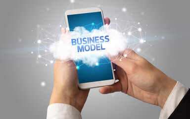 Hand using smartphone with cloud business concept