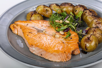 Roasted salmon fillet with vegetables