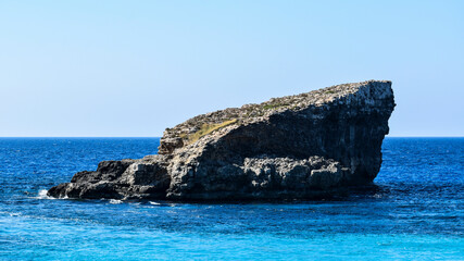 Giant rock in the middle of the sea