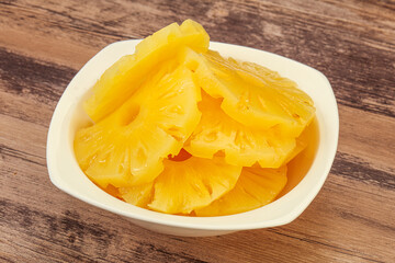 Marinated pineapple rings in the bowl