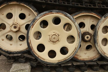 Close up of a tank's sprockets from World War Two in good condition. Retro transport and military technology concept.