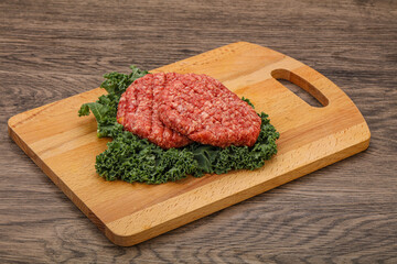 Raw beef burger cutlet for cooking