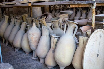 Pompeii, Italy, June 26, 2020 amphorae in an ancient deposit found after the excavations later
to...