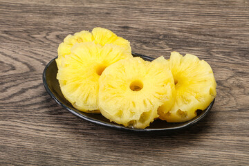 Sweet pineapple rings in the bowl