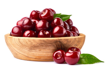 wooden bowl of sweet cherry fruits isolated on white background