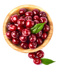 wooden bowl of sweet cherry fruits isolated on white background